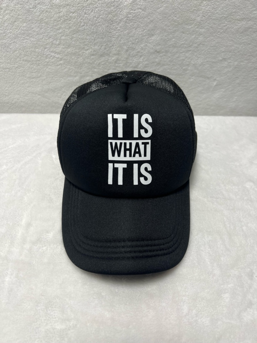 NWOT Black Baseball Cap Trucker Hat Mesh Back with "IT IS WHAT IT IS" Graphic